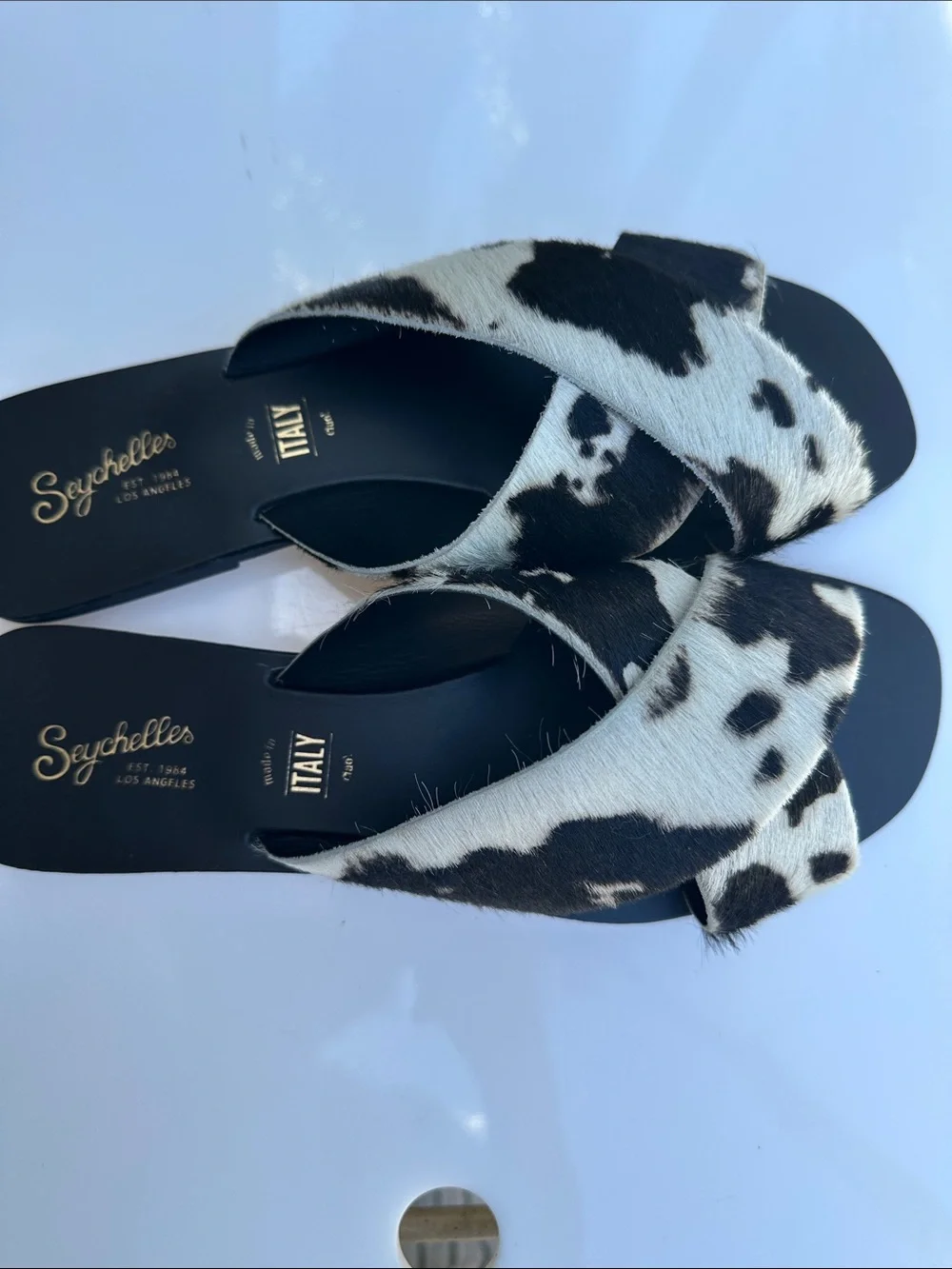 Seychelles Black and White Cowhide Crossband Slides